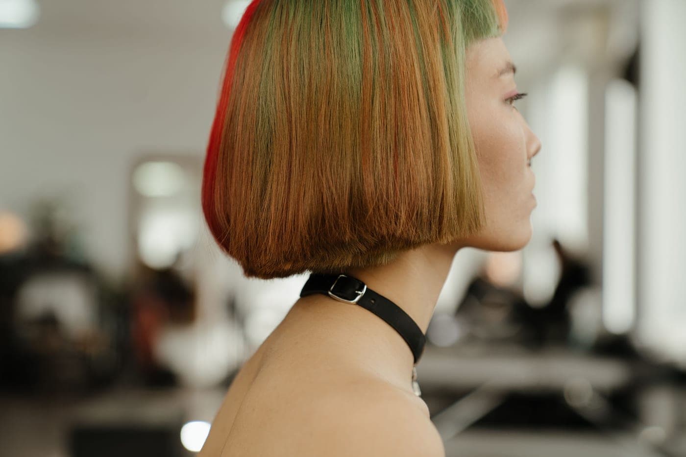 Color being applied to sectioned hair in a salon