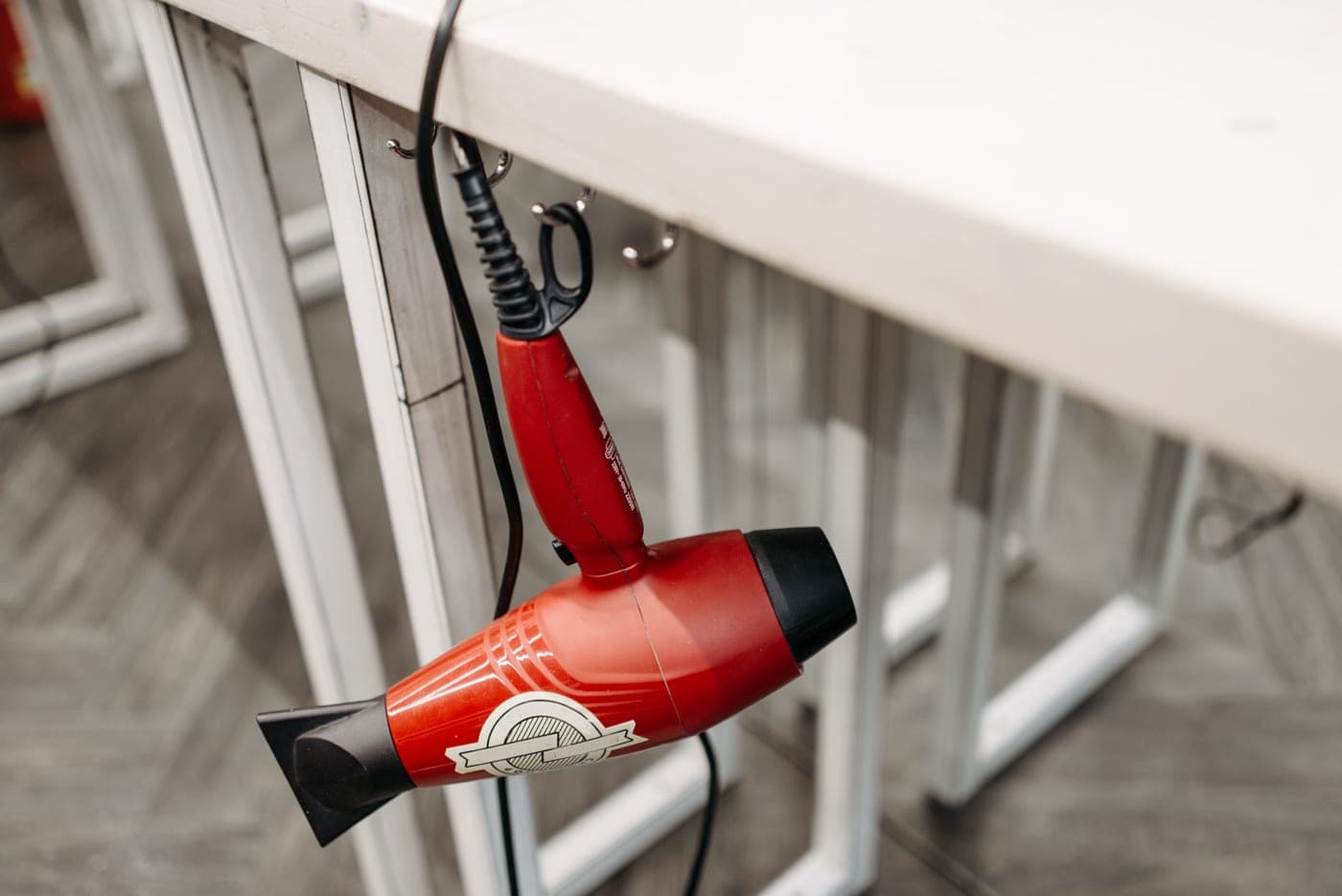 A concentrator nozzle fitted to the end of a hair dryer