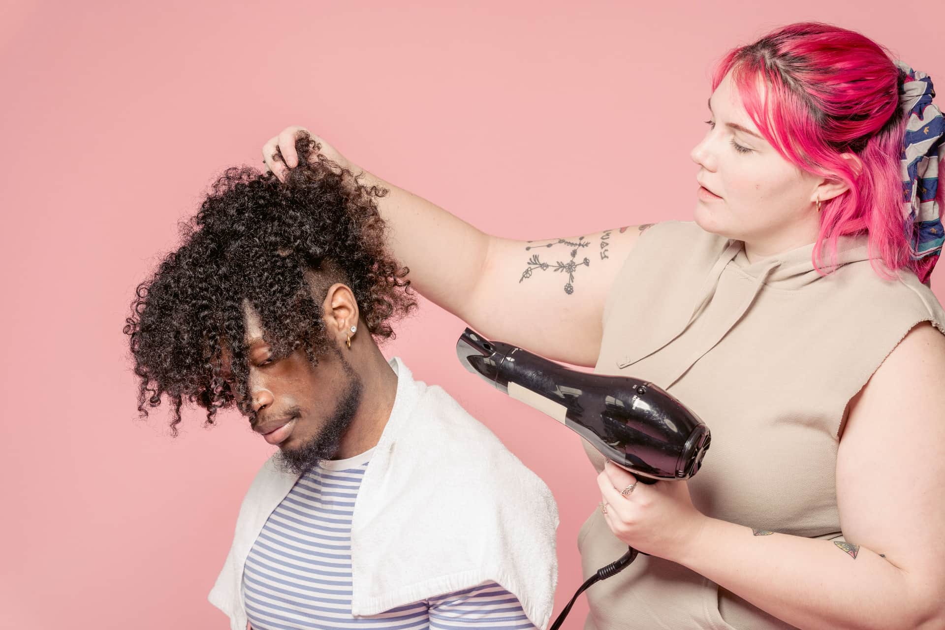 A diffuser attachment drying textured hair gently