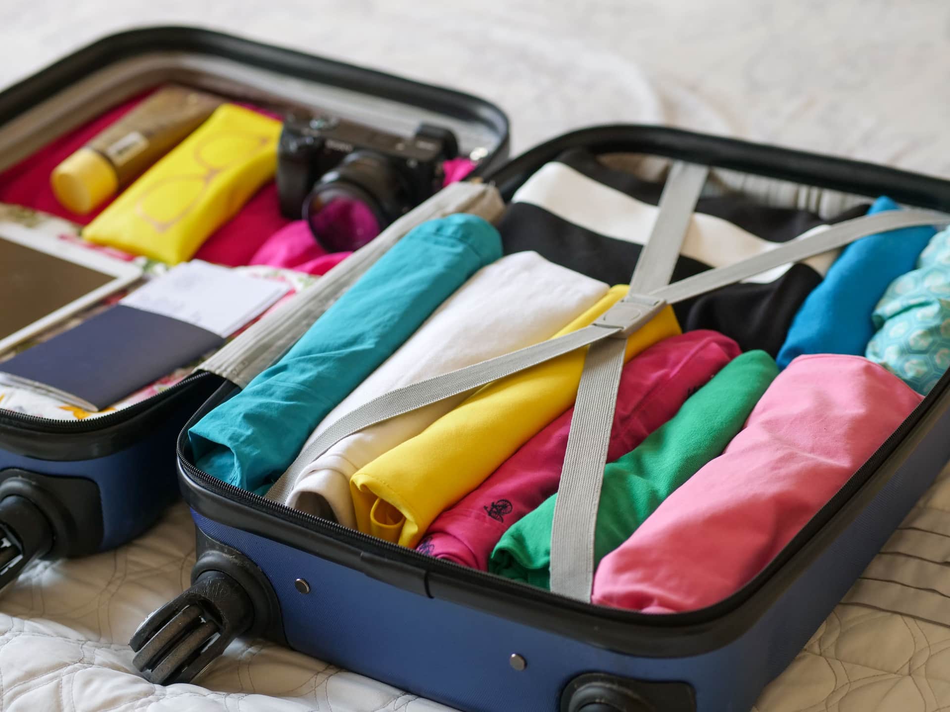 A compact hair dryer packed into a suitcase